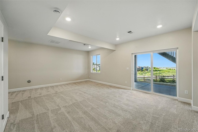 9374 Quartz St, Arvada, CO 80007 - empty room featuring light carpet, baseboards, recessed lighting, and a smoke detector