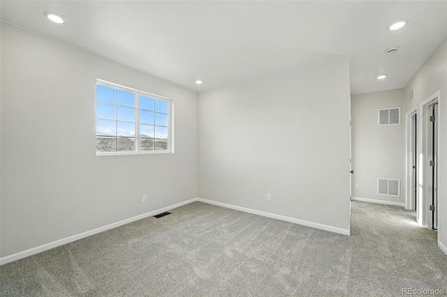 9374 Quartz St, Arvada, CO 80007 - carpeted spare room with baseboards, recessed lighting, and a smoke detector