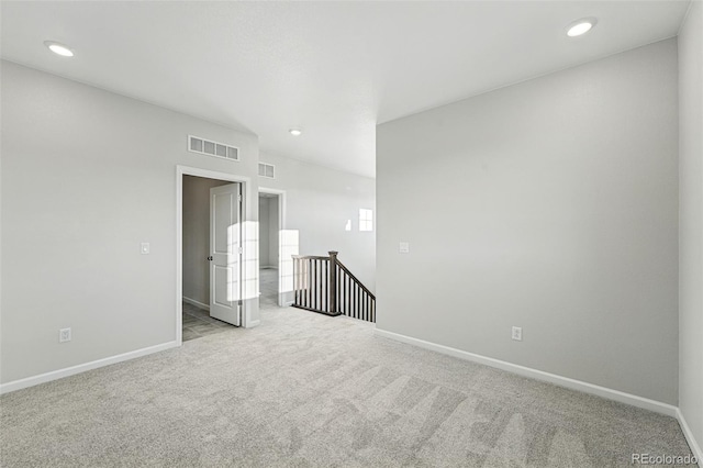 9374 Quartz St, Arvada, CO 80007 - empty room featuring light carpet, baseboards, and recessed lighting