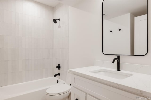 bathroom with vanity, toilet, and tub / shower combination