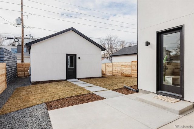 view of outbuilding with an outbuilding and a fenced backyard