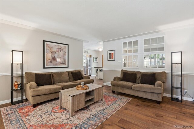 1774 S Dover Way, Lakewood, CO 80232 - living room with wood finished floors and baseboards