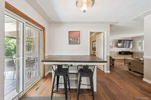 1774 S Dover Way, Lakewood, CO 80232 - dining space with wood finished floors and baseboards