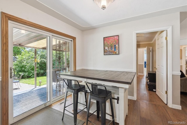 1774 S Dover Way, Lakewood, CO 80232 - dining room featuring dark wood-style flooring and baseboards