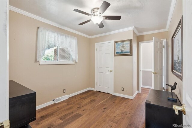 1774 S Dover Way, Lakewood, CO 80232 - office space with wood finished floors, a ceiling fan, and ornamental molding