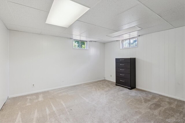 1774 S Dover Way, Lakewood, CO 80232 - basement with healthy amount of natural light, carpet, and a drop ceiling