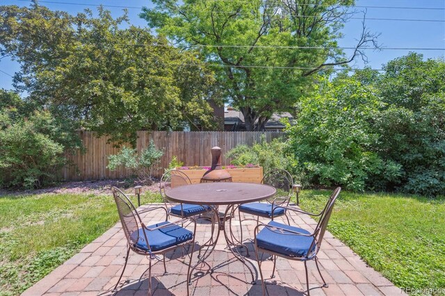 1774 S Dover Way, Lakewood, CO 80232 - view of patio featuring outdoor dining space
