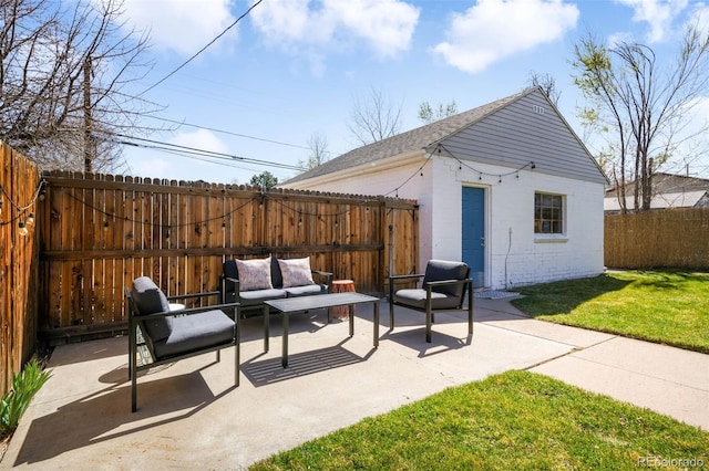 view of patio / terrace with an outdoor structure, outdoor lounge area, and a fenced backyard