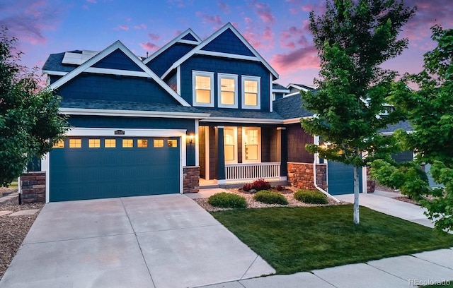10387 Harrisburg St, Parker, CO 80134 - craftsman inspired home featuring stone siding, a porch, driveway, and a lawn