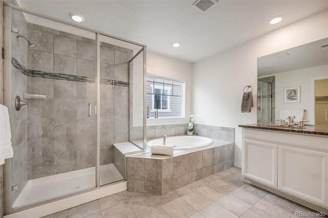 10387 Harrisburg St, Parker, CO 80134 - full bathroom with a bath, vanity, a stall shower, tile patterned floors, and recessed lighting