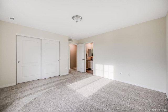 10387 Harrisburg St, Parker, CO 80134 - unfurnished bedroom with carpet, a closet, and ensuite bathroom