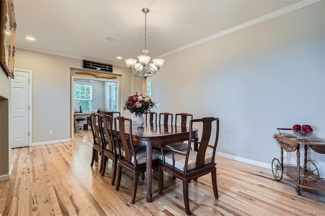 23503 E Minnow Dr, Aurora, CO 80016 - dining room with light wood-type flooring, ornamental molding, a chandelier, and recessed lighting