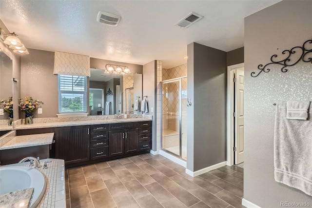 23503 E Minnow Dr, Aurora, CO 80016 - bathroom with a stall shower, vanity, a bath, and a chandelier