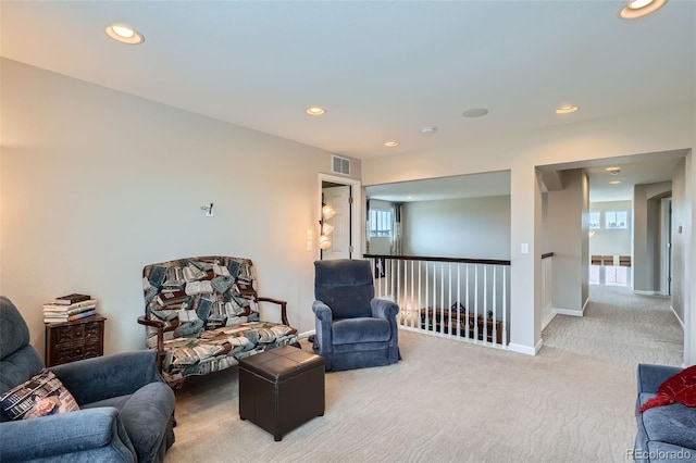 23503 E Minnow Dr, Aurora, CO 80016 - sitting room with an upstairs landing, carpet flooring, and recessed lighting