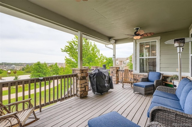 23503 E Minnow Dr, Aurora, CO 80016 - wooden terrace with grilling area and ceiling fan