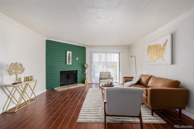 living room with dark hardwood / wood-style flooring and crown molding