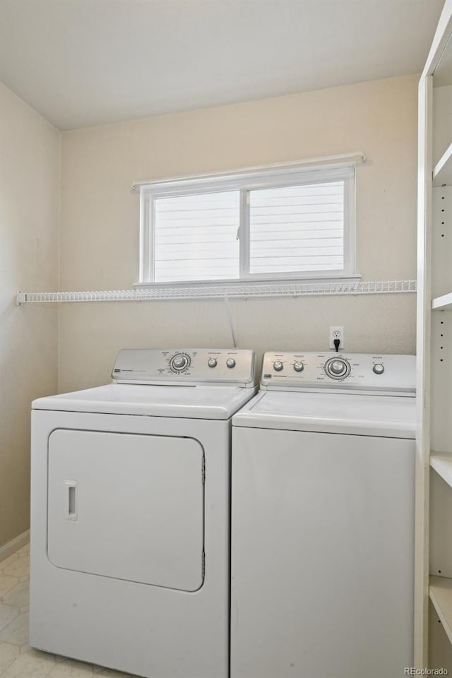 1272 Braewood Ave, Highlands Ranch, CO 80129 - washroom featuring washer and clothes dryer and plenty of natural light