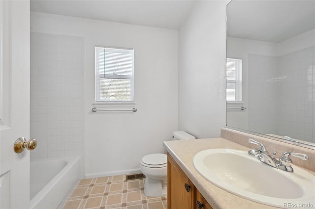 1272 Braewood Ave, Highlands Ranch, CO 80129 - bathroom with toilet, vanity, and baseboards
