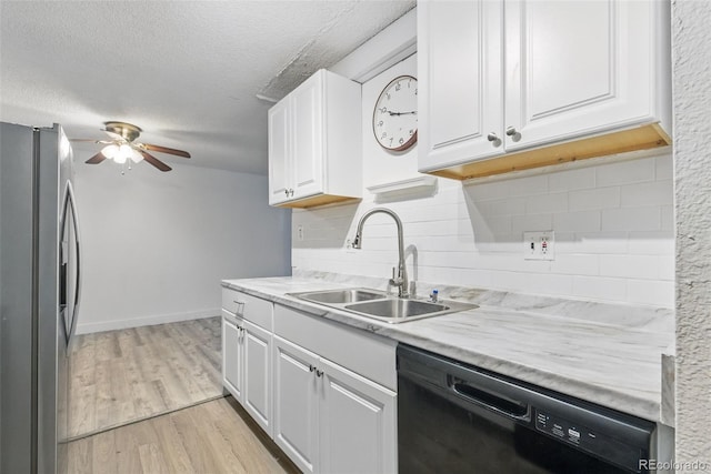 7755 E Quincy Ave Unit 107D2, Denver, CO 80237 - kitchen featuring stainless steel fridge with ice dispenser, black dishwasher, a sink, ceiling fan, and white cabinetry