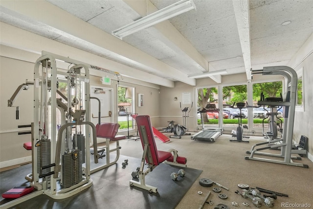 7755 E Quincy Ave Unit 107D2, Denver, CO 80237 - workout area with plenty of natural light and beamed ceiling