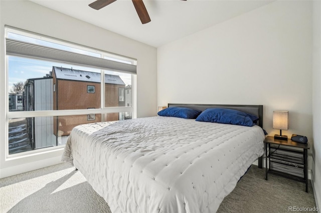 bedroom featuring ceiling fan and carpet floors