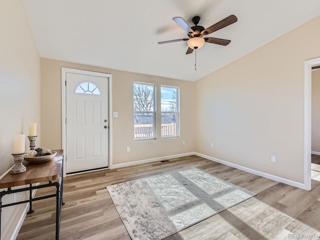 entrance foyer featuring light hardwood / wood-style floors and ceiling fan