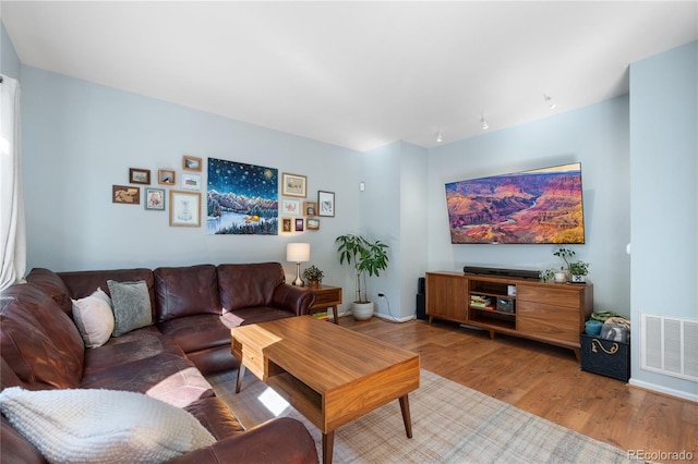 living room featuring light wood-type flooring