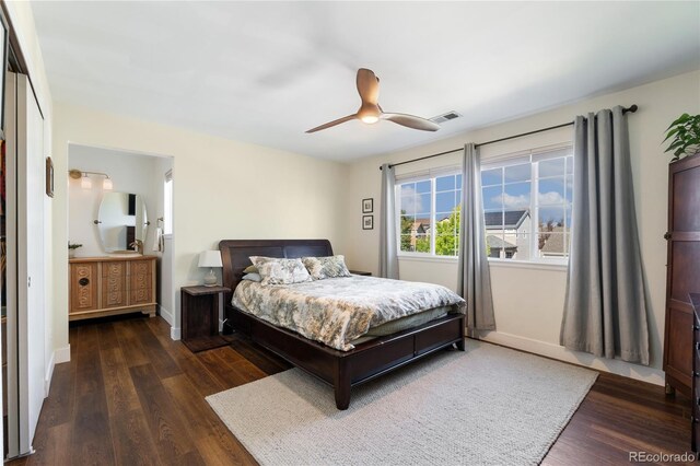 bedroom featuring ceiling fan and dark hardwood / wood-style flooring