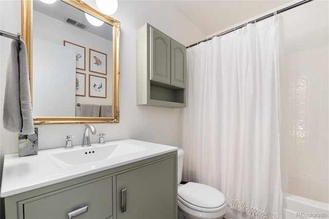 full bathroom with vanity, toilet, and shower / bath combo with shower curtain