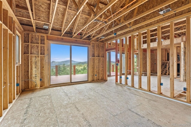 miscellaneous room with a mountain view