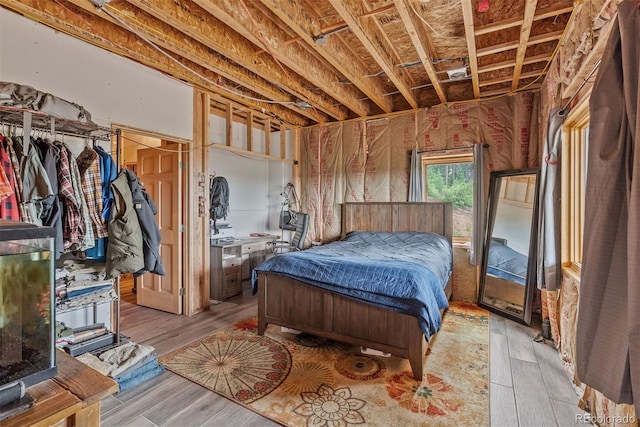 bedroom with light hardwood / wood-style floors