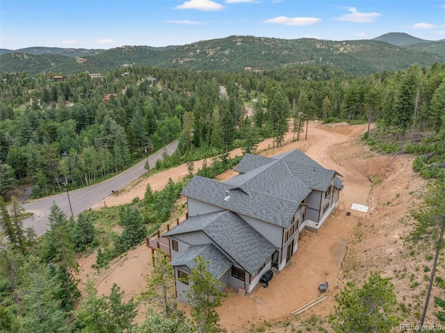 drone / aerial view featuring a mountain view