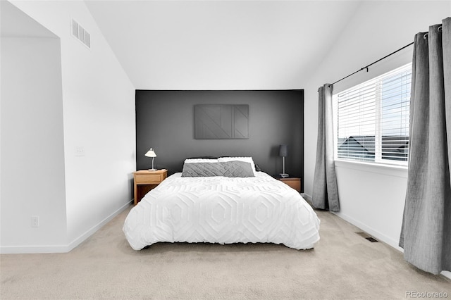 5387 Pierson Ct, Wheat Ridge, CO 80033 - carpeted bedroom with lofted ceiling and baseboards