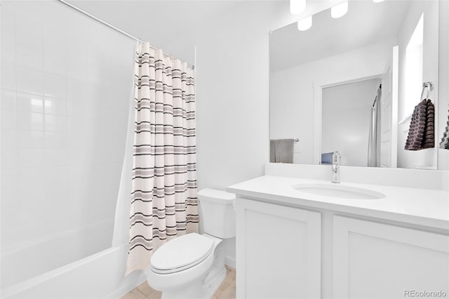5387 Pierson Ct, Wheat Ridge, CO 80033 - full bath featuring toilet, vanity, shower / bath combination with curtain, and tile patterned floors