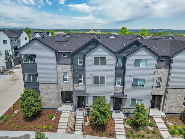5387 Pierson Ct, Wheat Ridge, CO 80033 - view of property featuring stone siding and a residential view