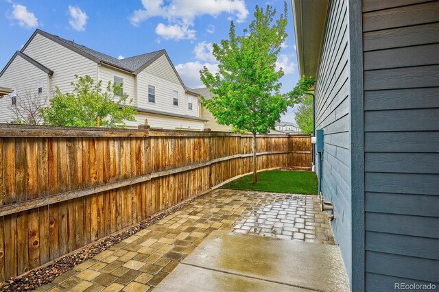 view of patio featuring a fenced backyard