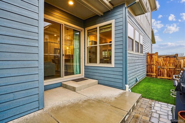 view of patio featuring fence