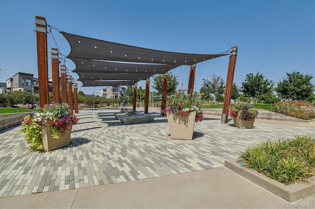 view of home's community featuring a patio area