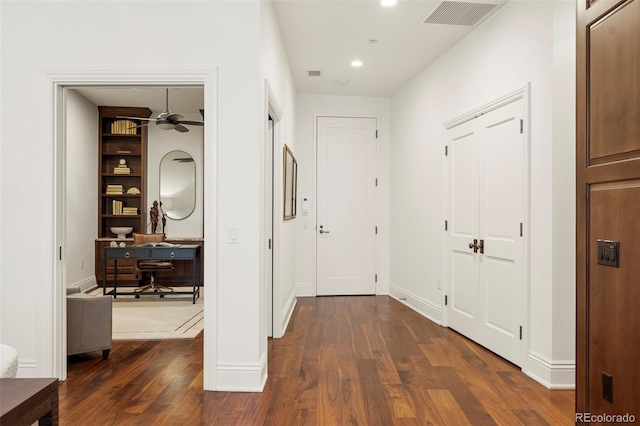 hall featuring dark hardwood / wood-style floors