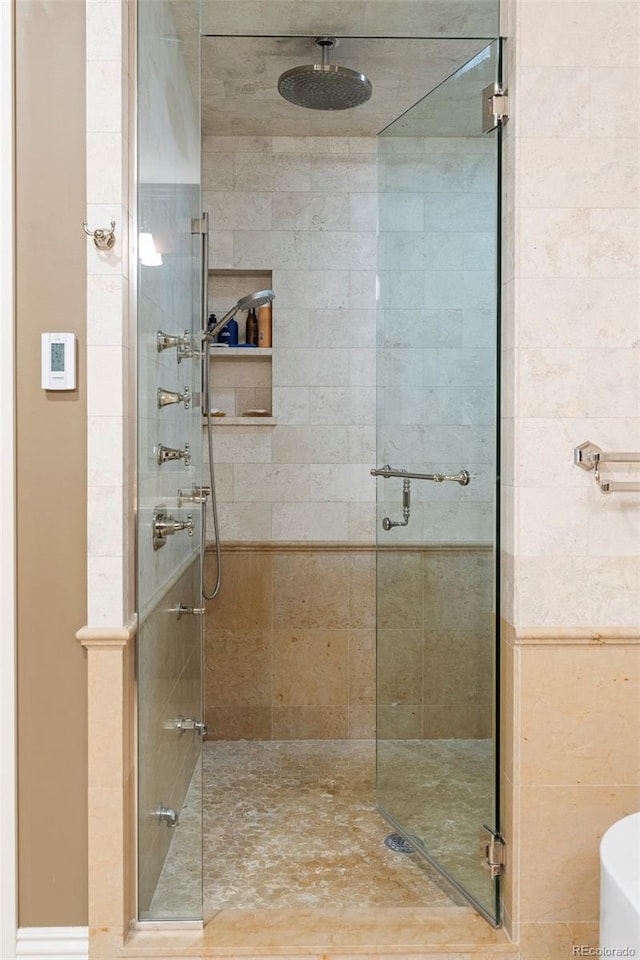 bathroom featuring an enclosed shower