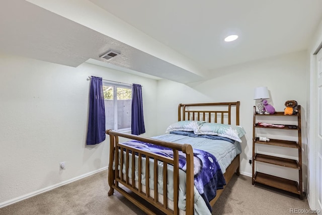 carpeted bedroom featuring visible vents, baseboards, and recessed lighting