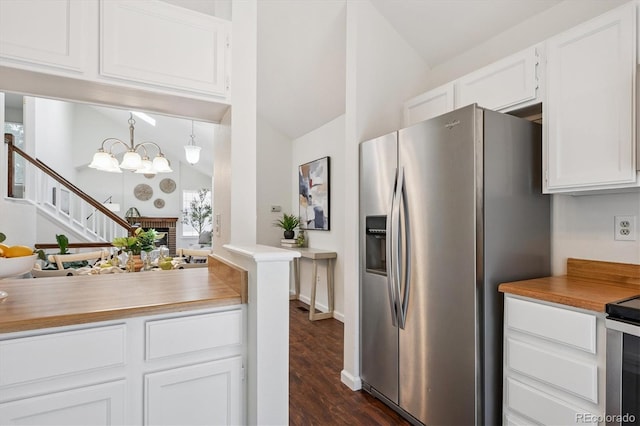 9194 Hickory Cir, Highlands Ranch, CO 80126 - kitchen with stainless steel fridge with ice dispenser, white cabinetry, dark wood-type flooring, vaulted ceiling, and light countertops