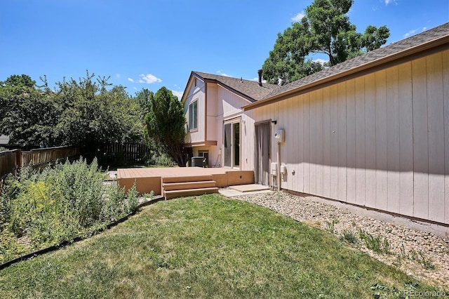 9194 Hickory Cir, Highlands Ranch, CO 80126 - fenced backyard featuring a wooden deck
