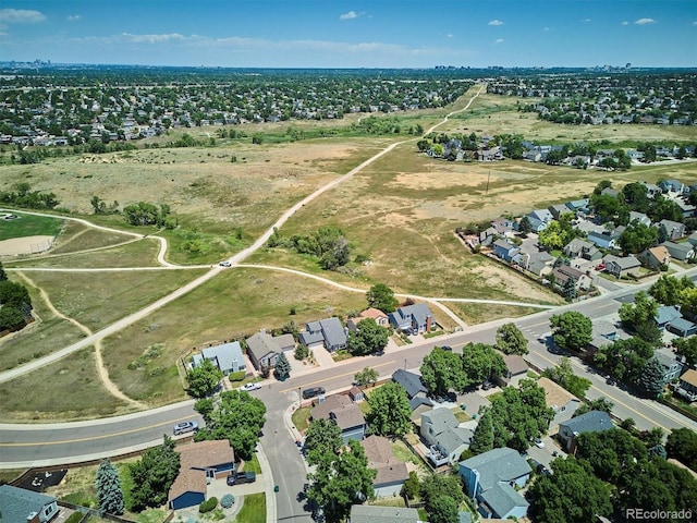 9194 Hickory Cir, Highlands Ranch, CO 80126 - aerial overview of property's location featuring nearby suburban area