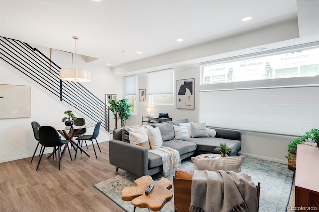 1238 Quitman St Unit 2, Denver, CO 80204 - living area featuring stairs, light wood-type flooring, and recessed lighting