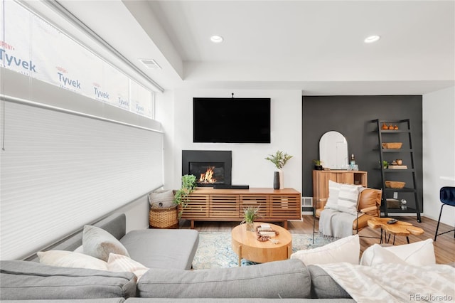 1238 Quitman St Unit 2, Denver, CO 80204 - living area featuring wood finished floors, recessed lighting, and a glass covered fireplace