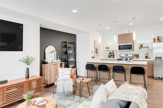 1238 Quitman St Unit 2, Denver, CO 80204 - living room featuring recessed lighting and light wood-style flooring