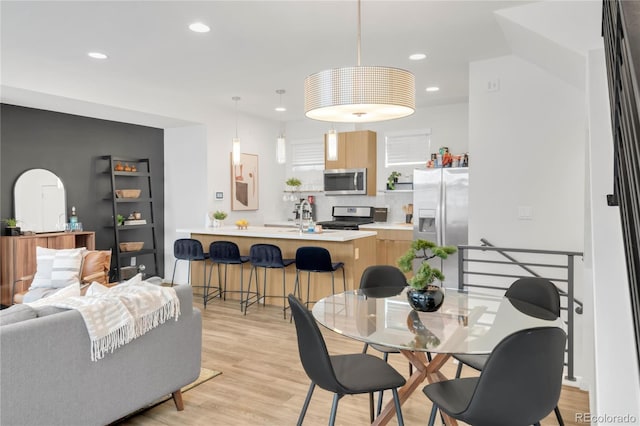 1238 Quitman St Unit 2, Denver, CO 80204 - dining room featuring recessed lighting and light wood-type flooring