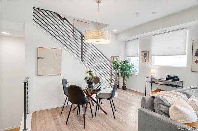 1238 Quitman St Unit 2, Denver, CO 80204 - dining area featuring light wood finished floors, stairway, and recessed lighting