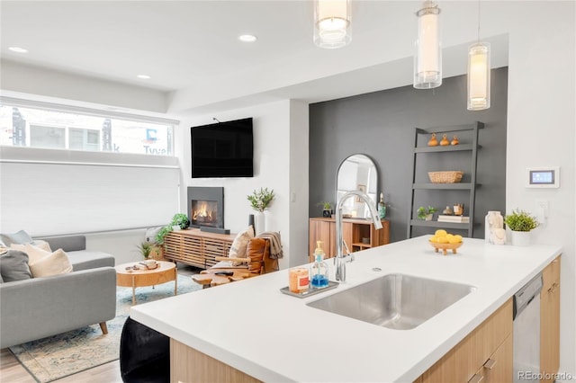 1238 Quitman St Unit 2, Denver, CO 80204 - kitchen with open floor plan, light countertops, dishwashing machine, light brown cabinets, and recessed lighting